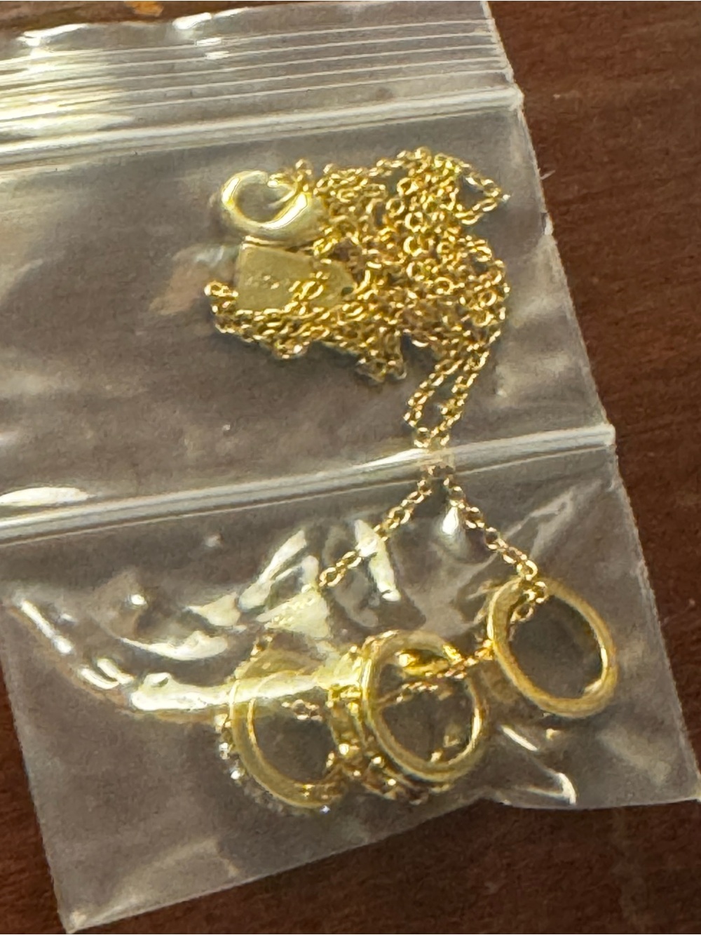 Coach Gold Tone Triple Interlocking Circle Necklace